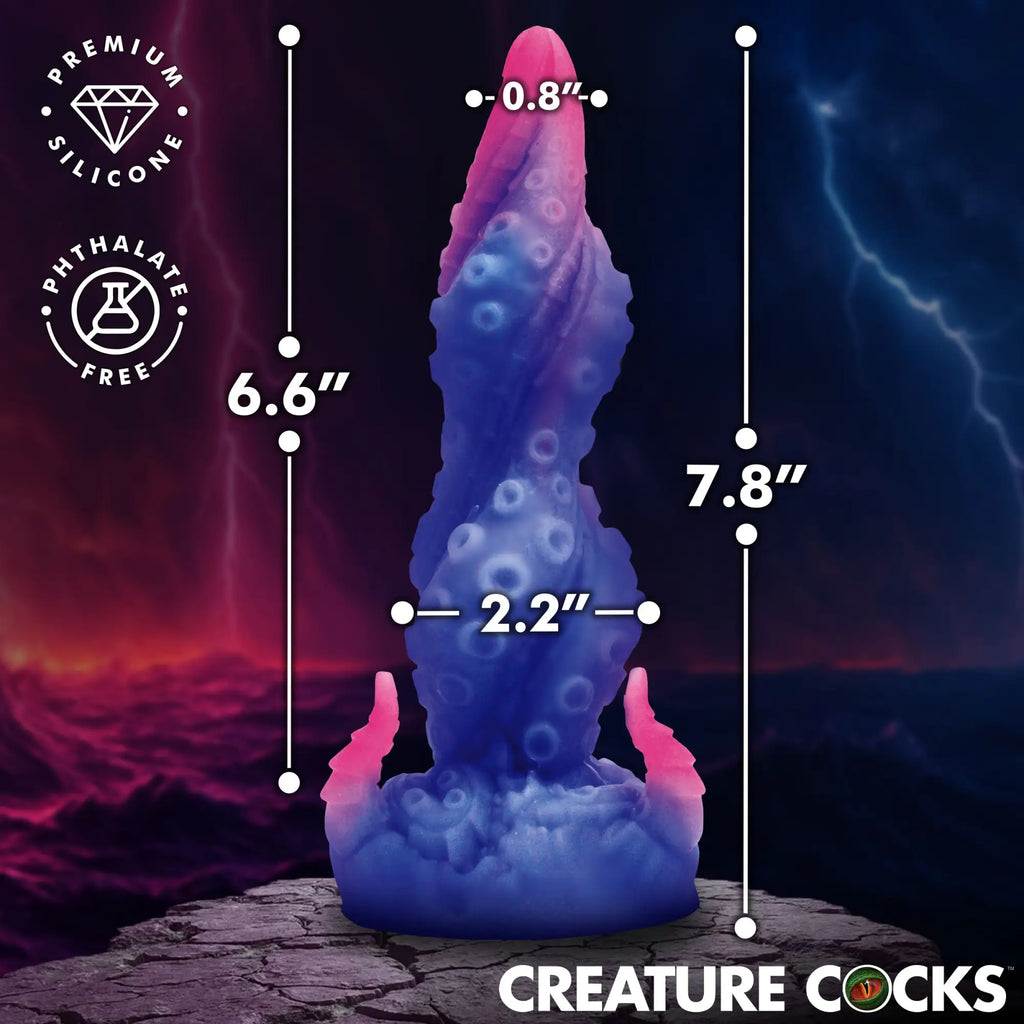 Creature Cocks Krakenar silicone dildo, a blue and pink tentacle-shaped toy with suction cups and dimension markers.