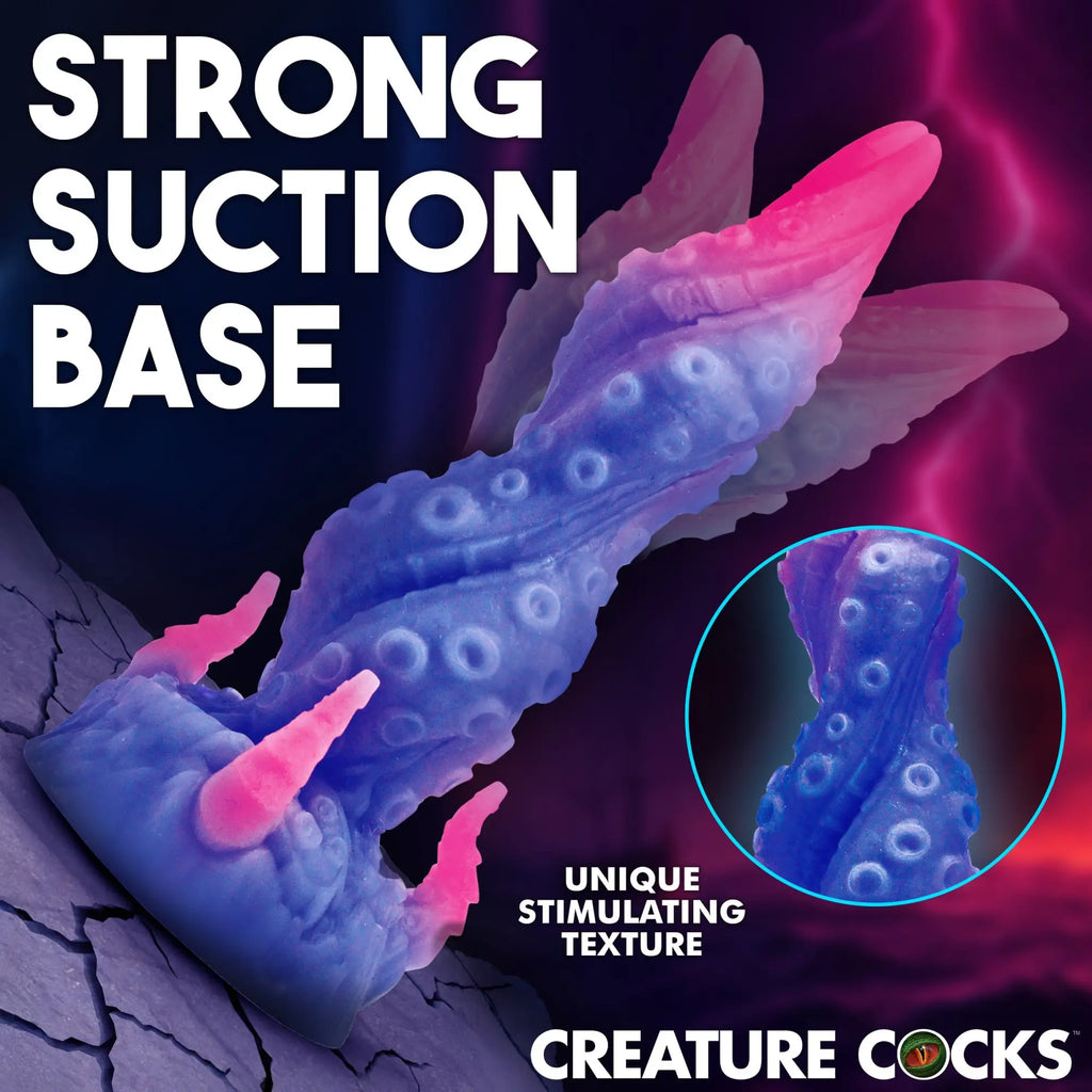 Creature Cocks Krakenar tentacle dildo in blue-to-pink gradient, featuring suction base and textured suction cups.