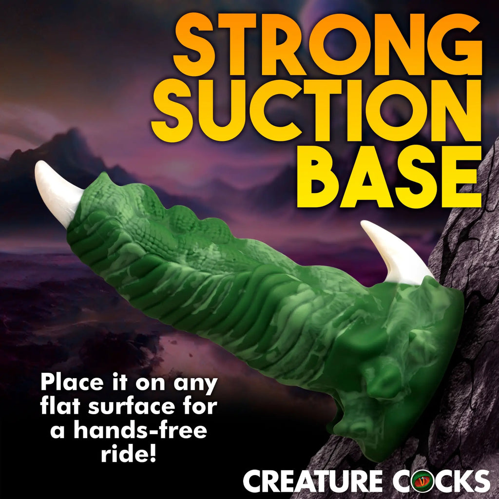 Creature Cocks Large Dragon Claw silicone dildo in green with white claw tips, featuring a strong suction base.