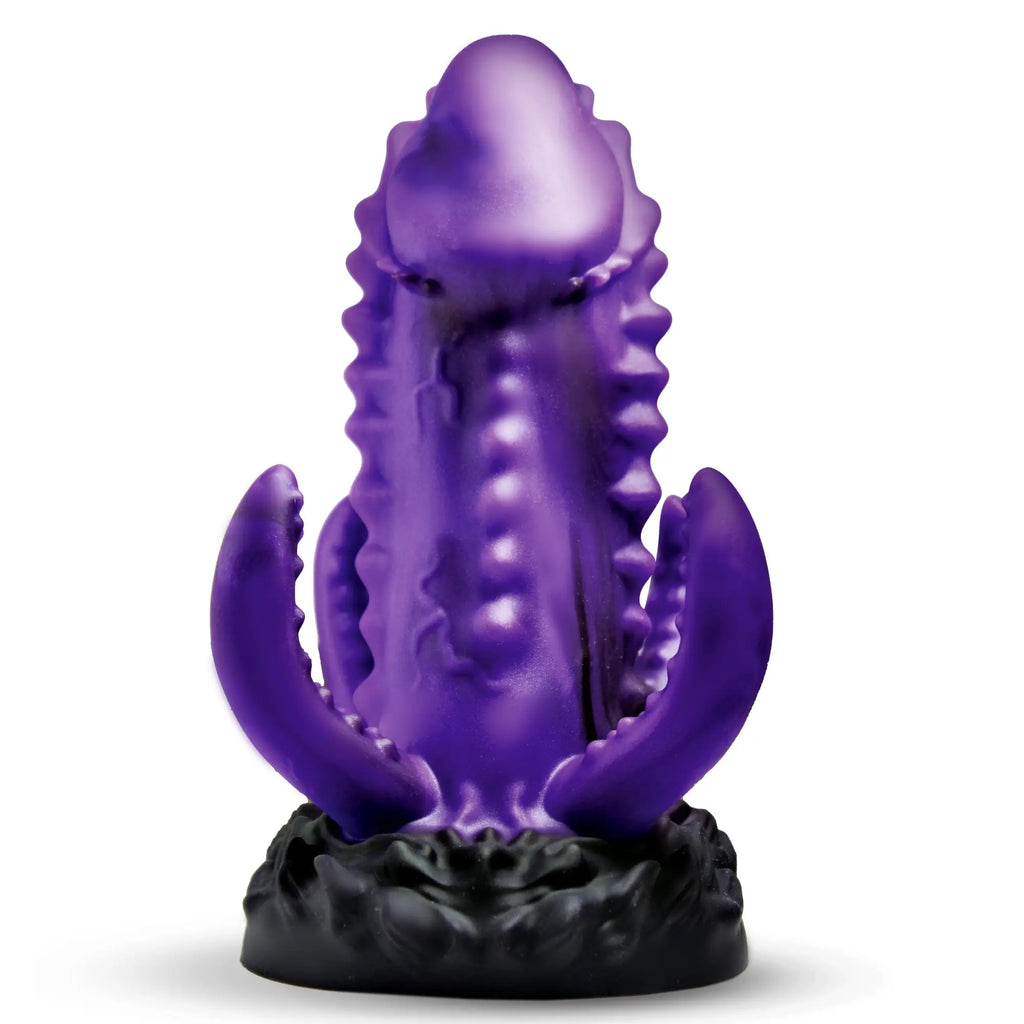 Creature Cocks Leviathan purple silicone dildo with textured tentacles and a black base against a white background.