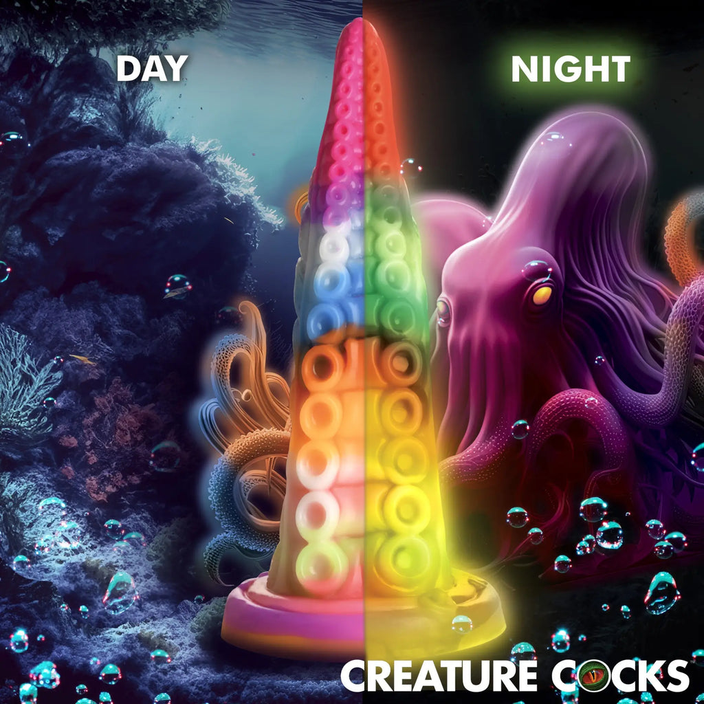 Creature Cocks Luminoctopus tentacle silicone dildo shown in day and night modes; features rainbow, glow-in-dark texture.