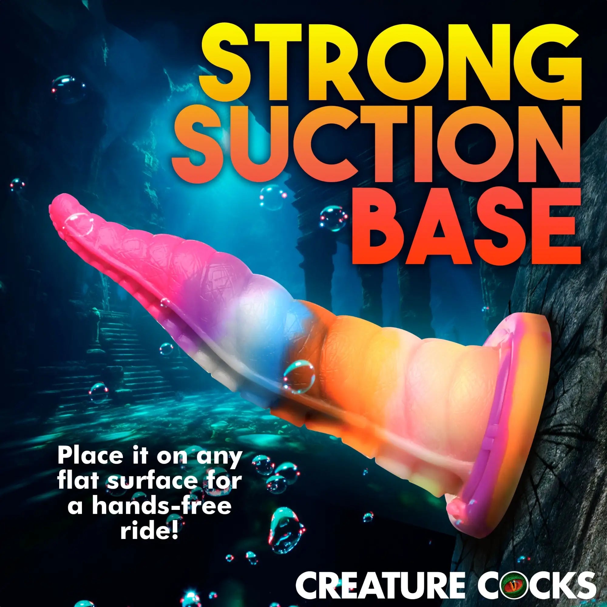 Creature Cocks Luminoctopus tentacle dildo, ombre pink-blue-orange silicone with suction base on an underwater background.