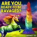 Creature Cocks Magic Rider unicorn dildo in a vibrant rainbow gradient, set against a fantasy landscape background.