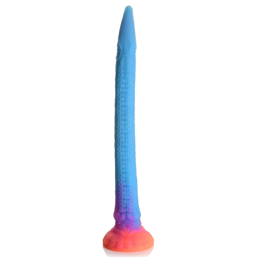 Creature Cocks Makara glow-in-the-dark silicone dildo: a blue-to-orange ombre snake-textured shaft with a flared base.