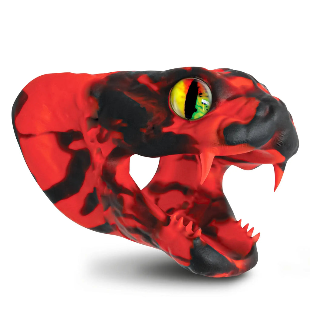 Creature Cocks Master Cobra silicone cock ring in a marbled red and black snake head design with a detailed yellow eye.