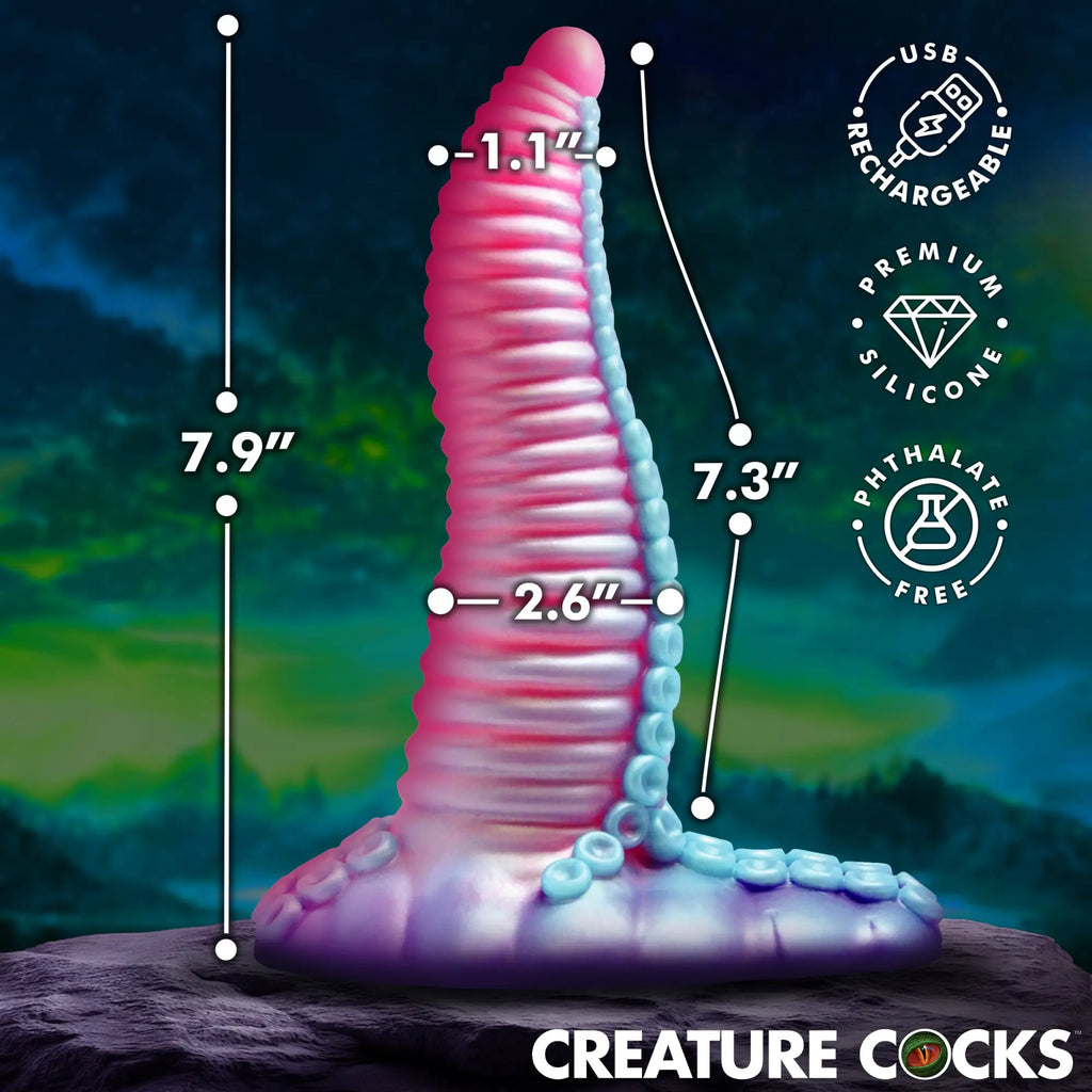 Creature Cocks Mega-Tenta vibrating silicone dildo. A pink-to-blue tentacle-style dildo with suction cup base and specs.