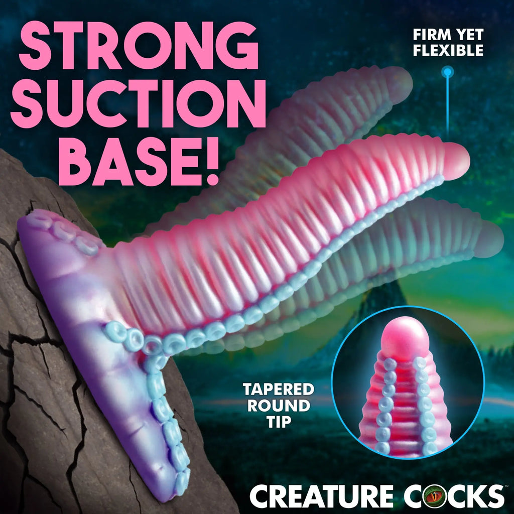 Creature Cocks Mega-Tenta vibrating dildo: a pink, tentacle-style silicone toy with blue suction cups and base.