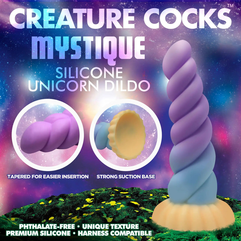 Creature Cocks Mystique purple and blue ombre unicorn dildo with a spiral shape and beige suction base.