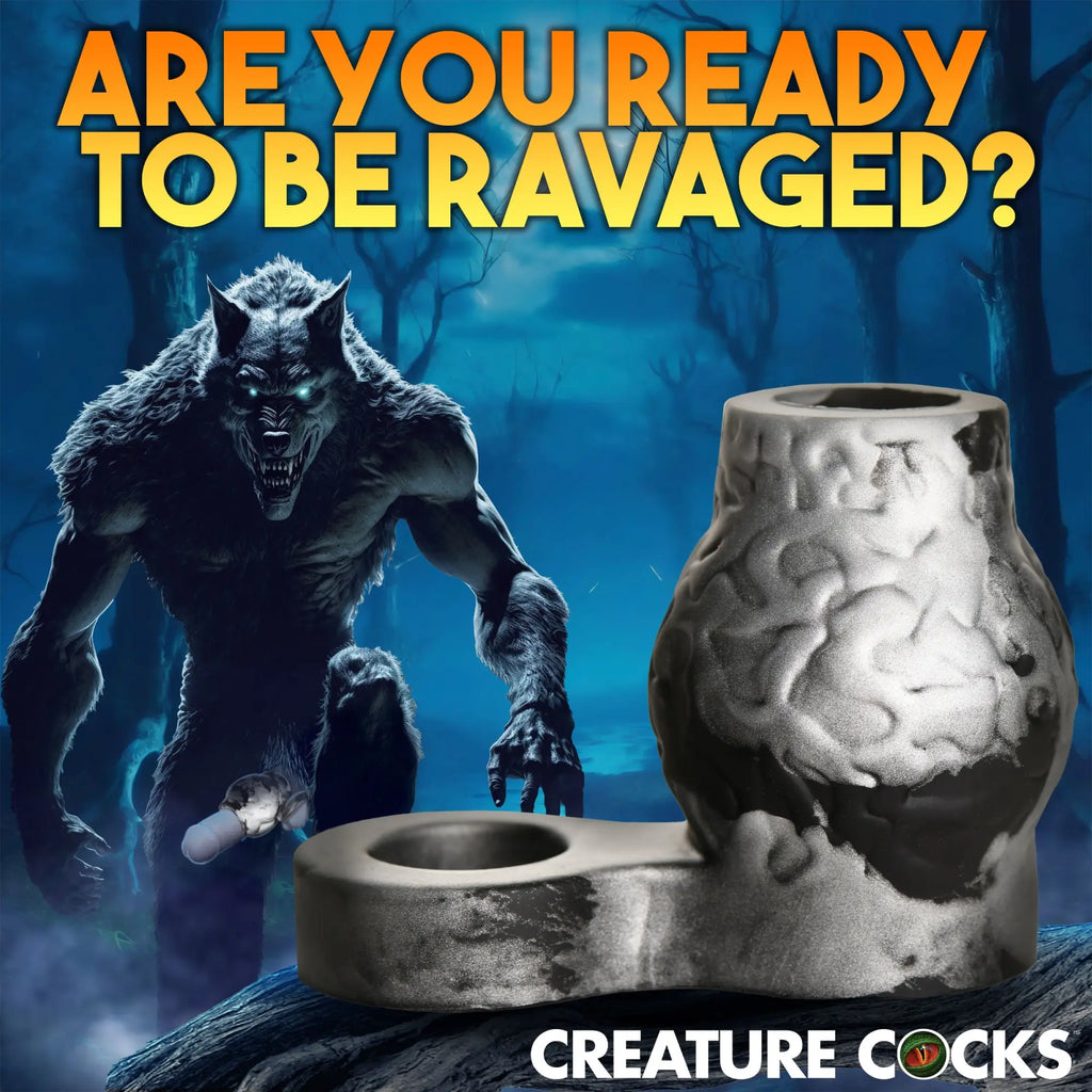 Creature Cocks Night Prowler: Black and grey marbled silicone girth enhancer with a ball strap, set against a werewolf.