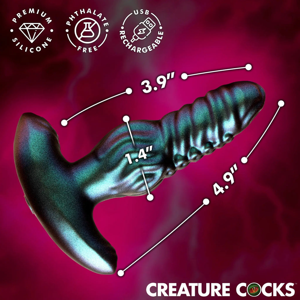 Creature Cocks Octo-Squirm iridescent silicone anal plug with measurement labels and feature icons against a pink background.