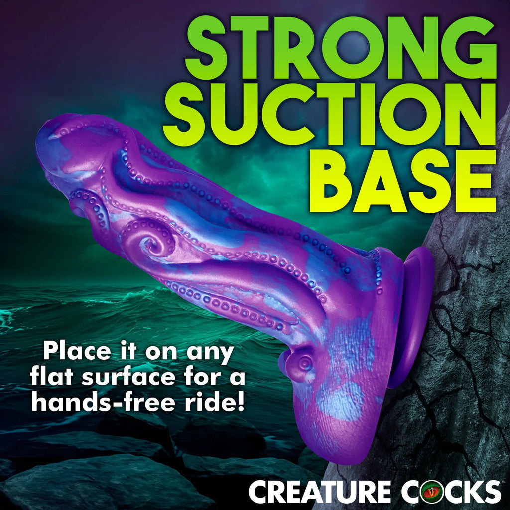Creature Cocks Octophallus dildo: a purple and blue silicone, tentacle-textured toy with a suction cup base.