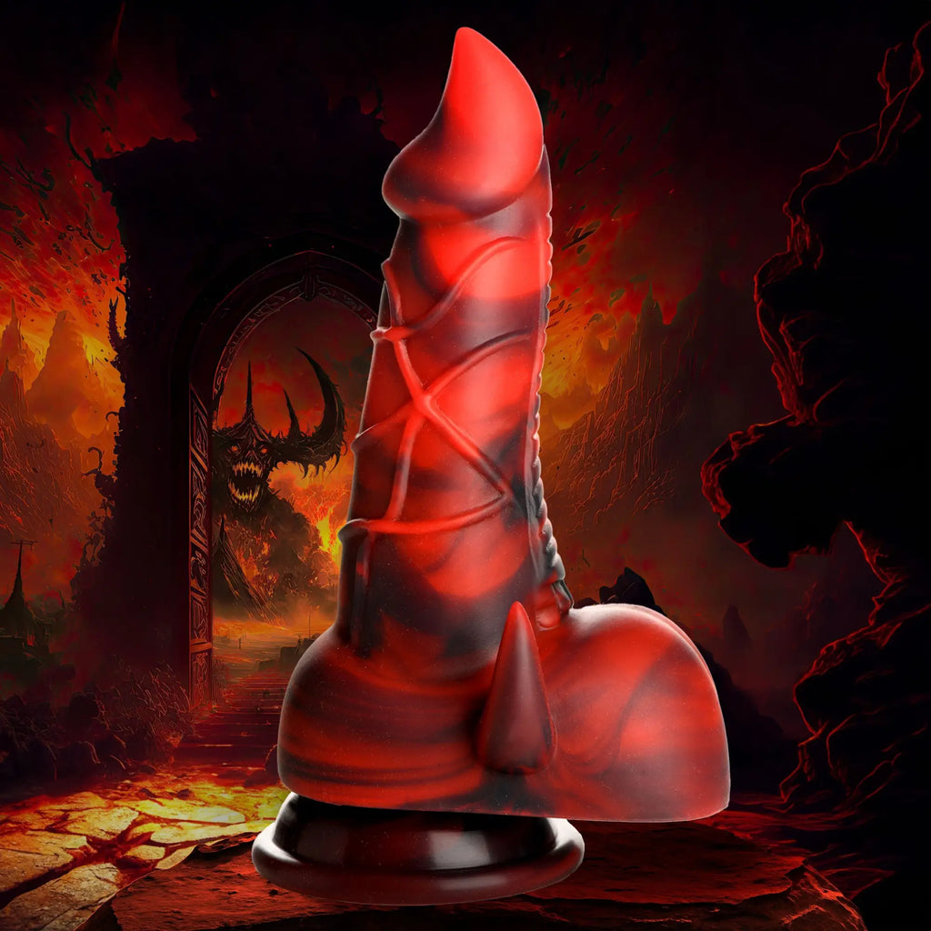 Creature Cocks Horny Devil silicone dildo in a red and black marbled design, featuring a flared base and demonic spikes.
