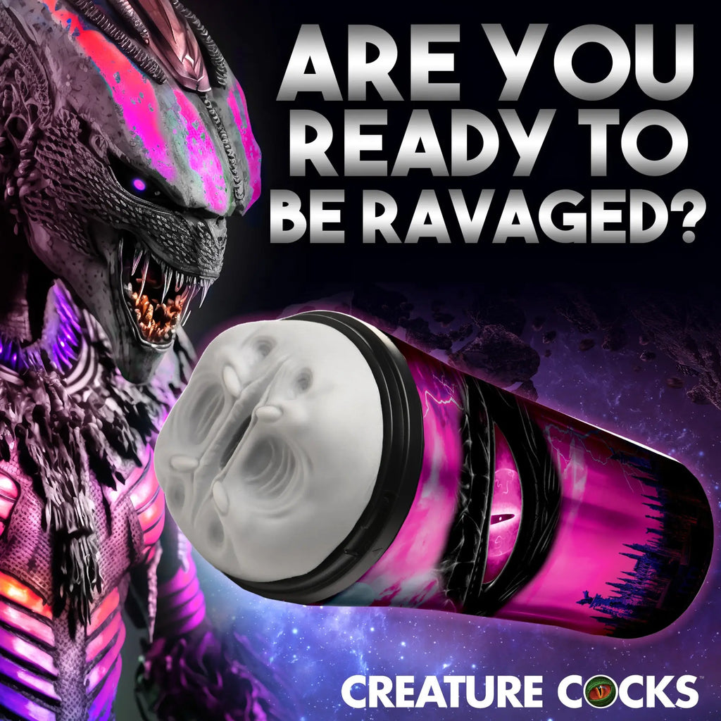 Creature Cocks Predator stroker with a white textured sleeve and a pink, alien-themed outer case.