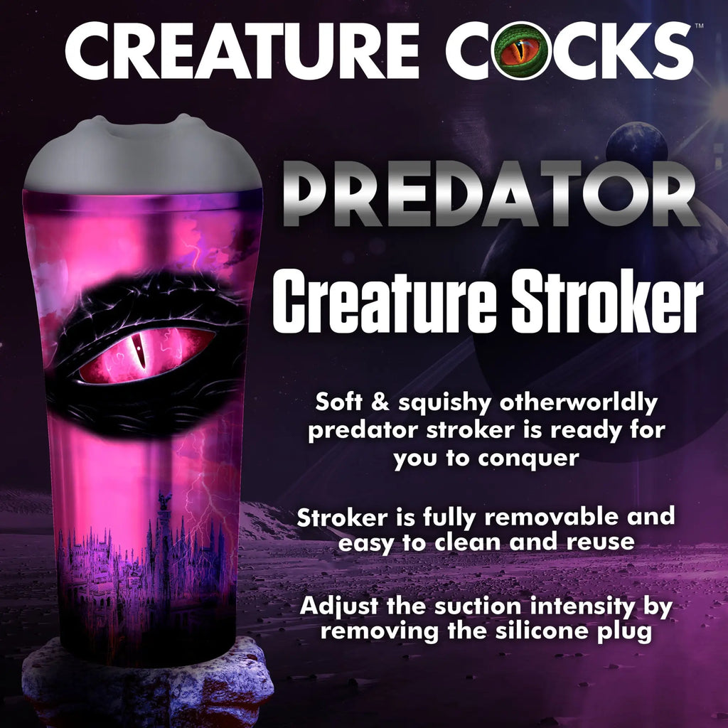 Creature Cocks Predator stroker in a pink and black alien eye graphic design against a space-themed background.