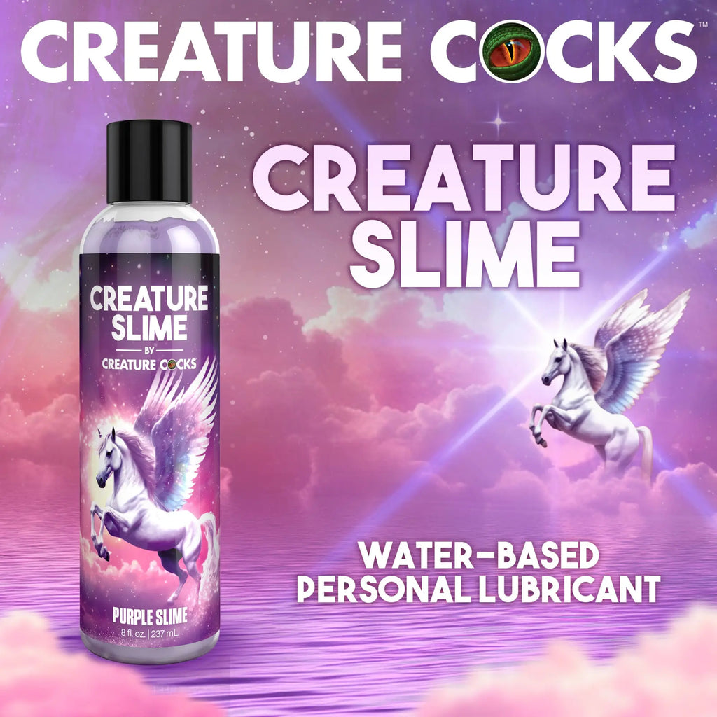 Creature Cocks Purple Creature Slime water-based lubricant bottle with a unicorn graphic against a purple cosmic sky.