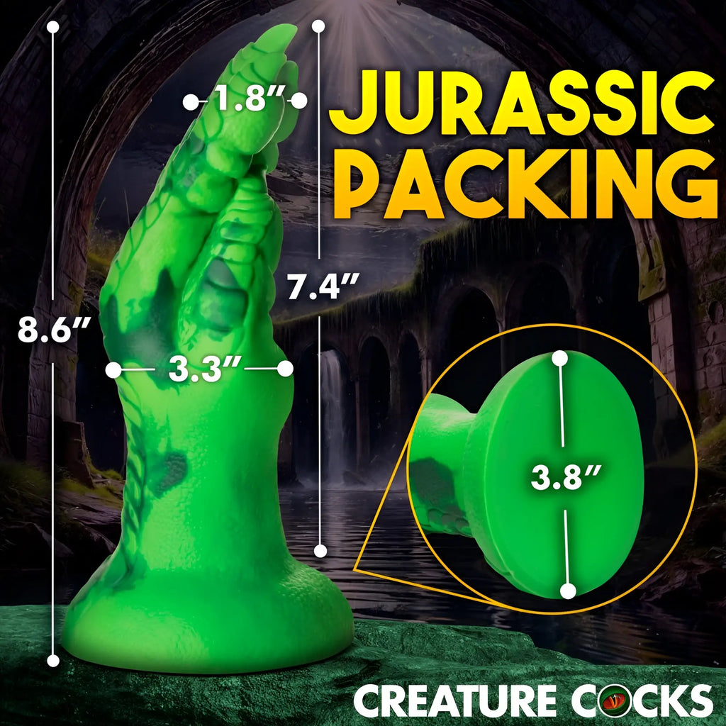 Creature Cocks Raptor Claw fisting silicone dildo in bright green with measurement overlays against a fantasy background.
