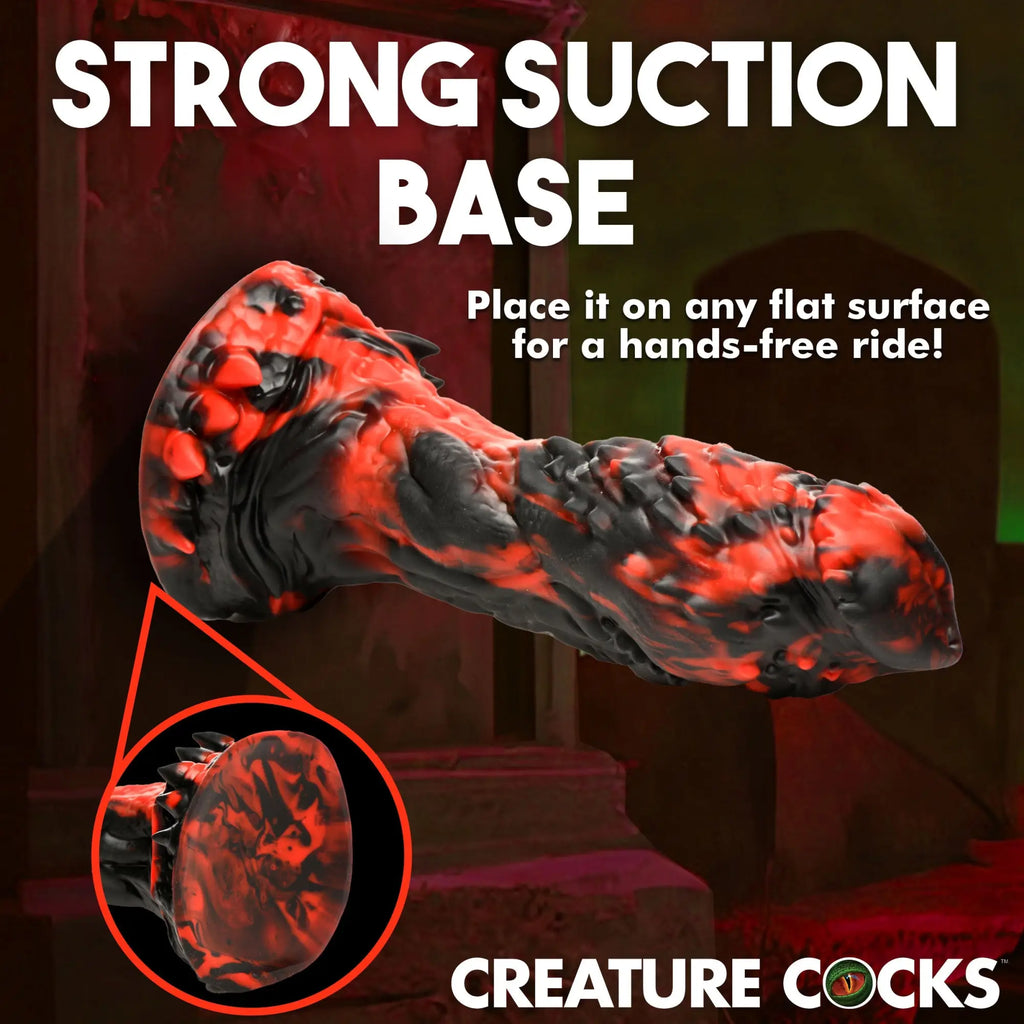 Creature Cocks Reaper silicone dildo in a black and red marbled monster style with a prominent suction base.