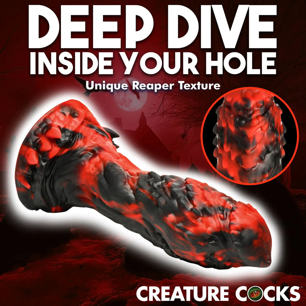 Creature Cocks Reaper silicone dildo in a black and red marbled swirl with a detailed, spiked, monster-like texture.