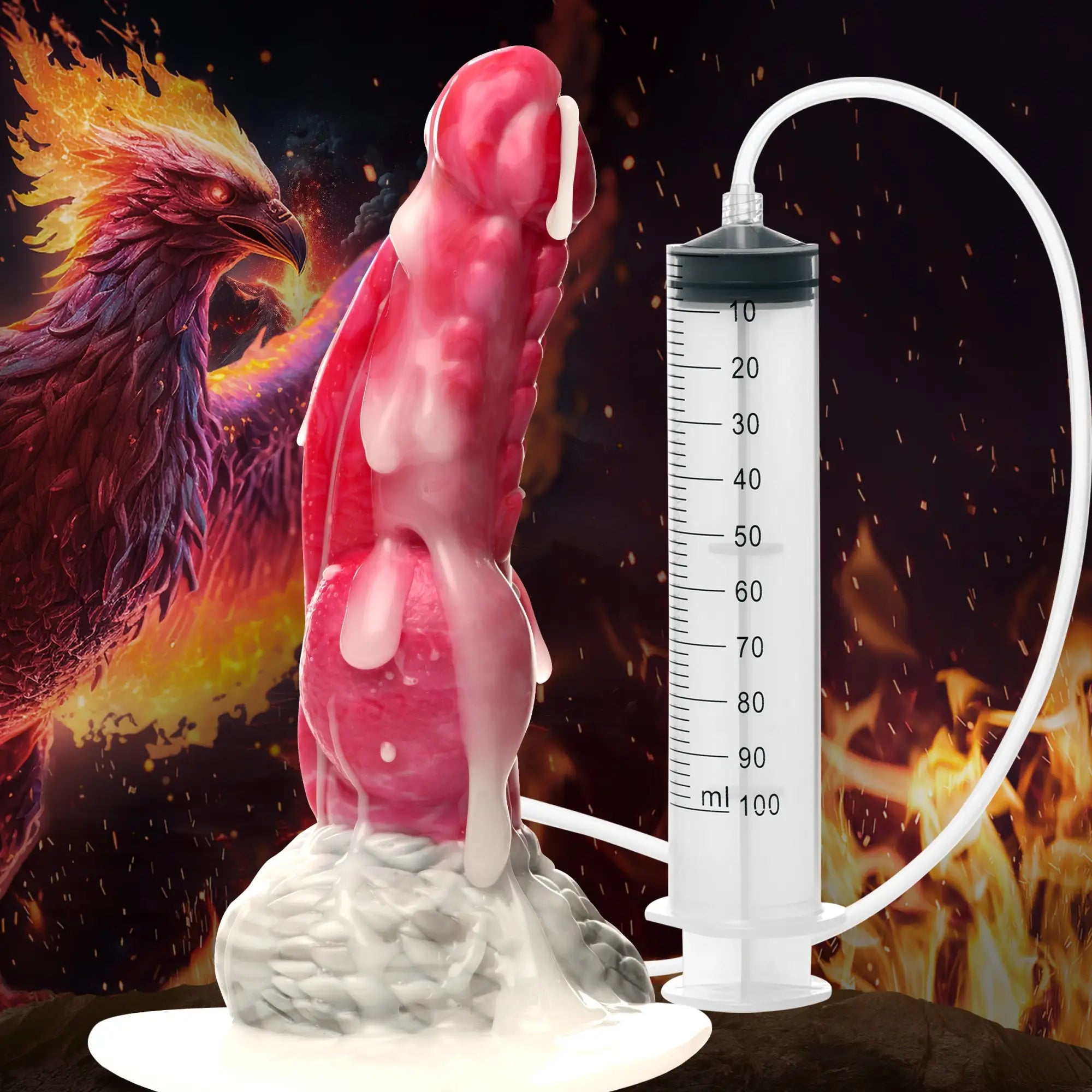 Creature Cocks Resurrector Phoenix red silicone squirting dildo with a 100ml syringe and tube, set against a fire theme.