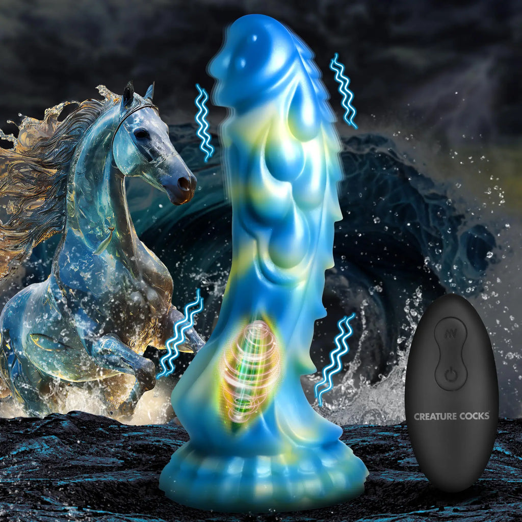 Creature Cocks Sea Stallion blue, fin-textured silicone dildo with a black remote, set against a stormy horse background.