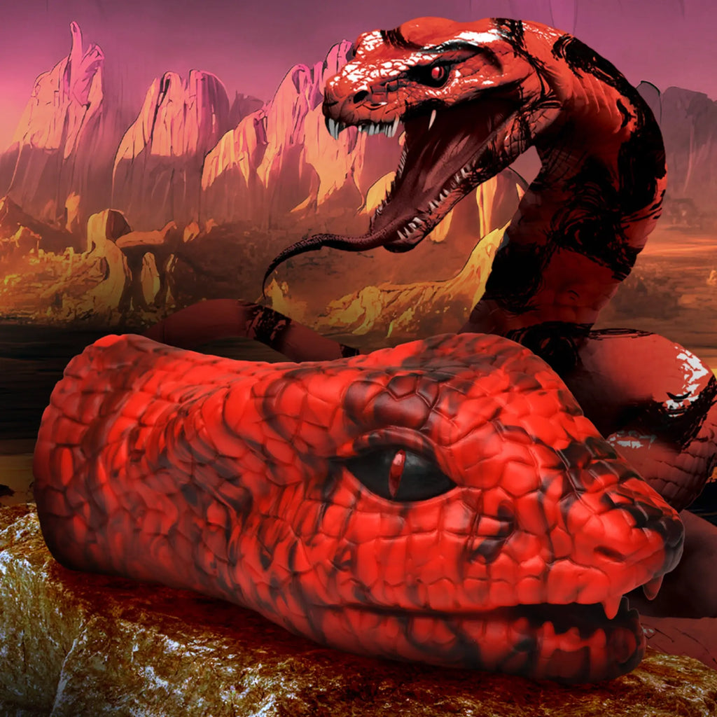 Creature Cocks Serpentine Stroker: red and black textured silicone masturbator shaped like a snake head.
