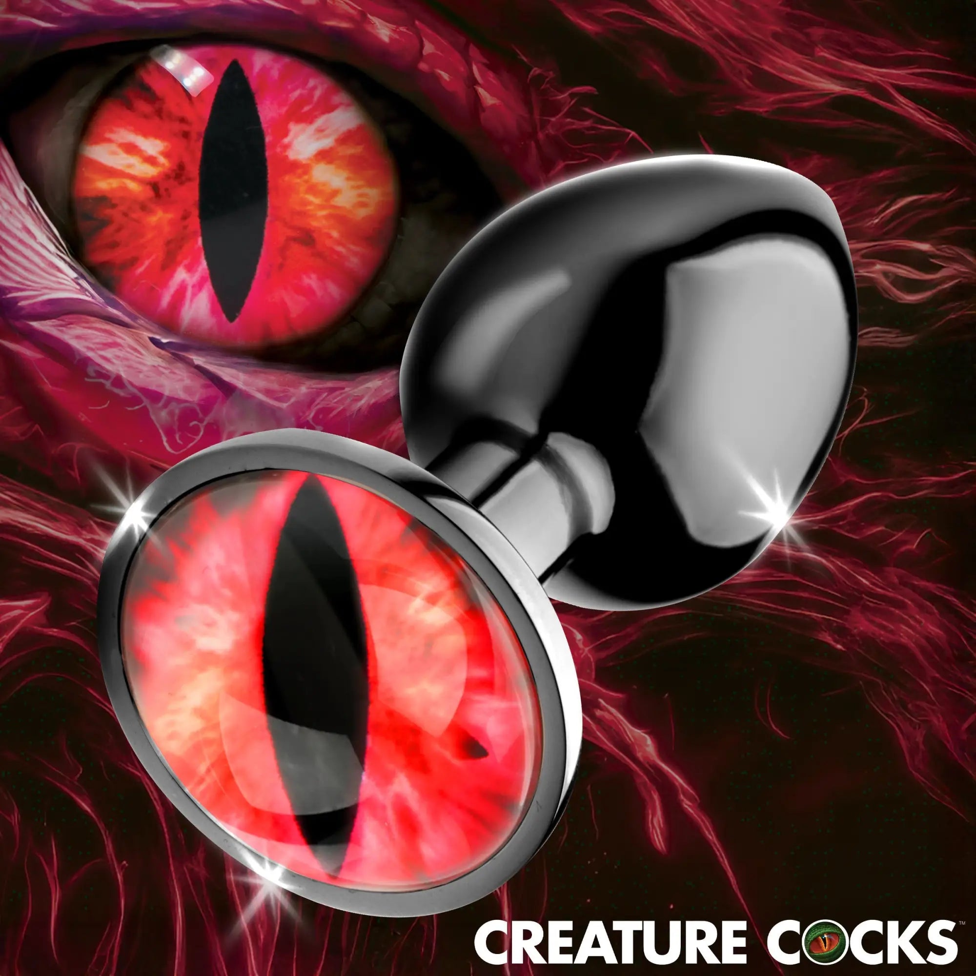 Creature Cocks Sinister Eye metal butt plug featuring a polished black teardrop base and a red reptilian eye design.