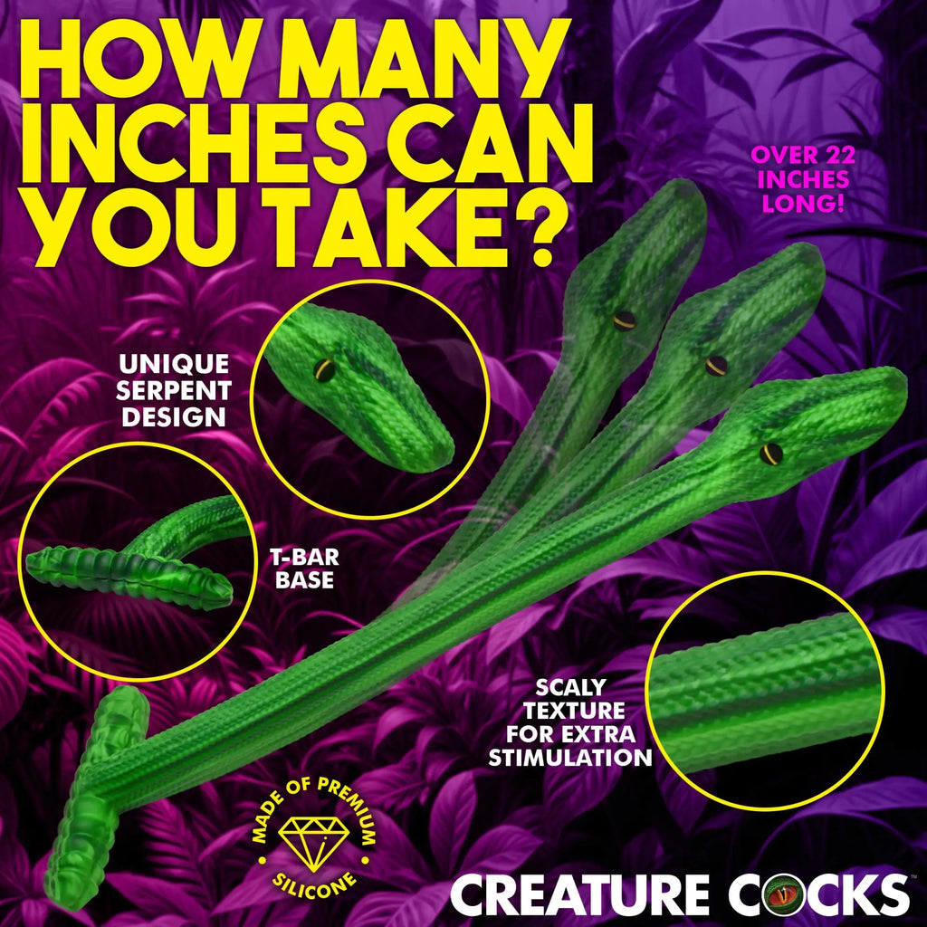 Creature Cocks Slither silicone dildo: a 22-inch green, textured snake-shaped toy with a T-bar base, set in a jungle.