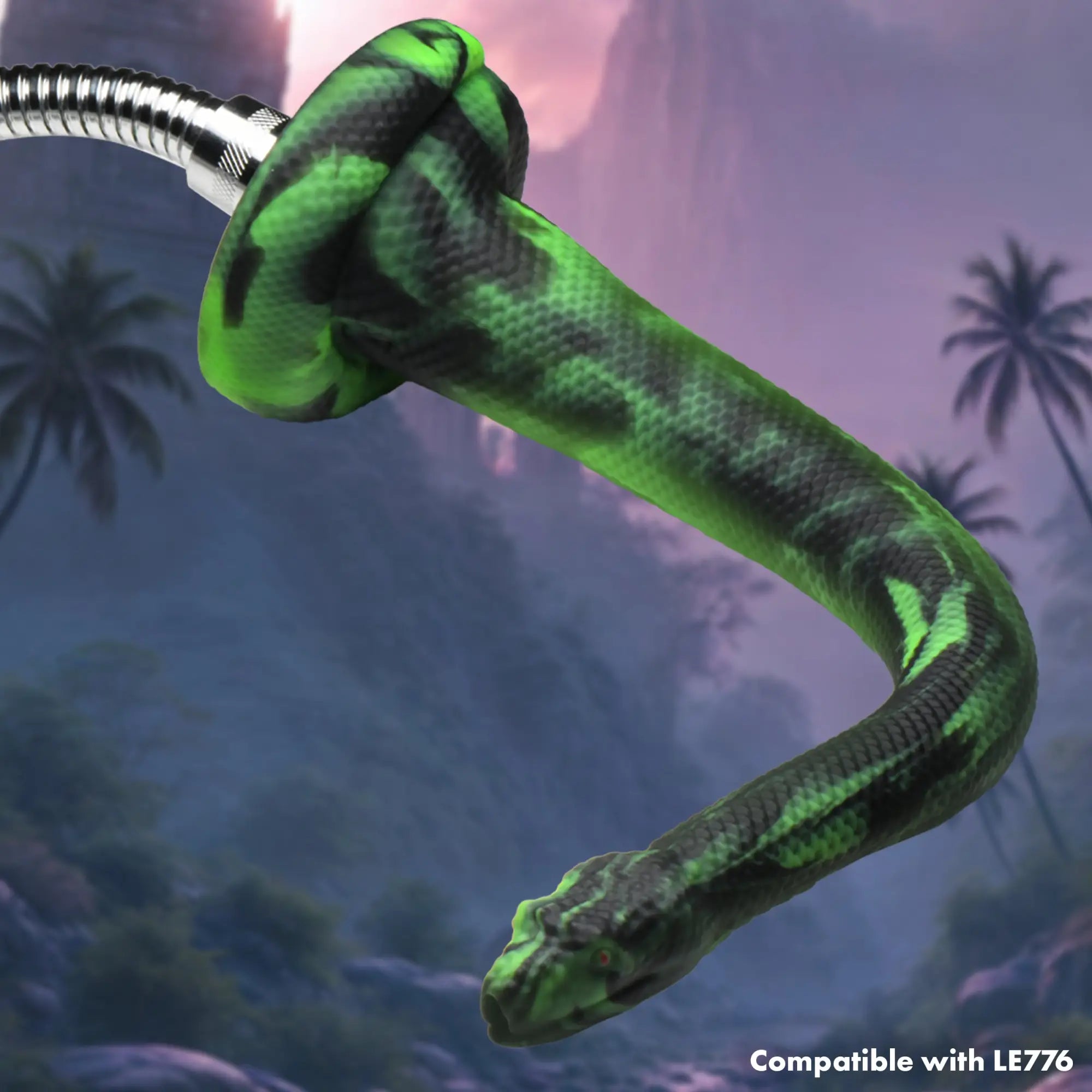 Creature Cocks Spitting Serpent: A textured green and black silicone snake enema nozzle attached to a metal hose.