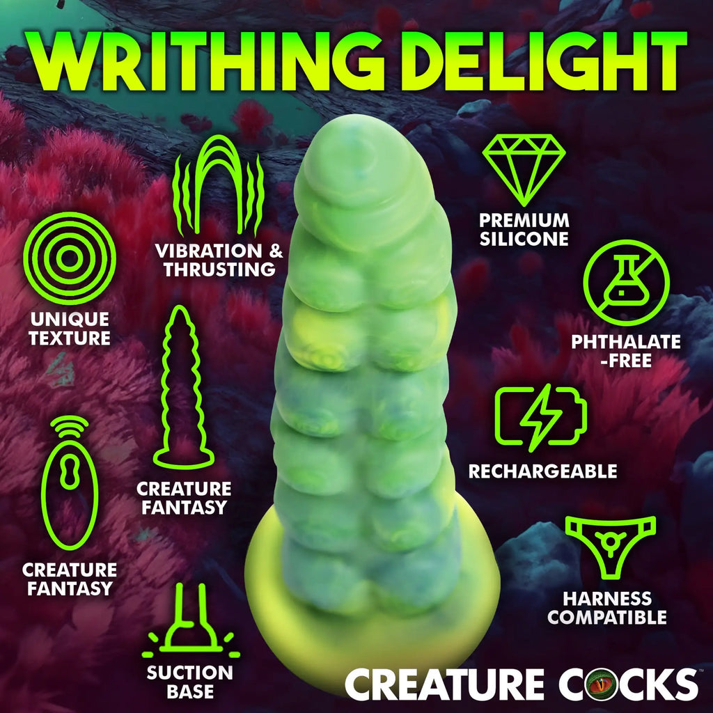 Creature Cocks Squirmer silicone dildo: a green, textured fantasy-style toy with a suction base and feature icons.