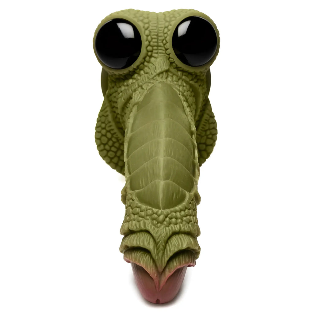 Creature Cocks Swamp Monster dildo: green, textured, scaly silicone design with large black eyes and a pink tip.
