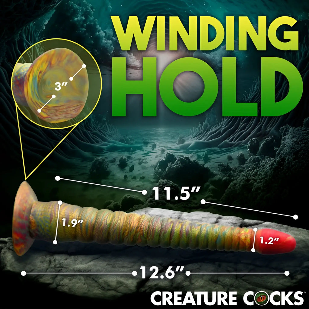 Creature Cocks Tenta-Dick dildo: a long, ribbed, multi-colored silicone tentacle toy with measurements shown on a rock.
