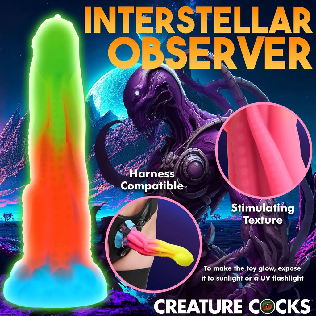 Creature Cocks Tenta-Glow silicone dildo in a vibrant, multi-color glowing tentacle style against a space background.