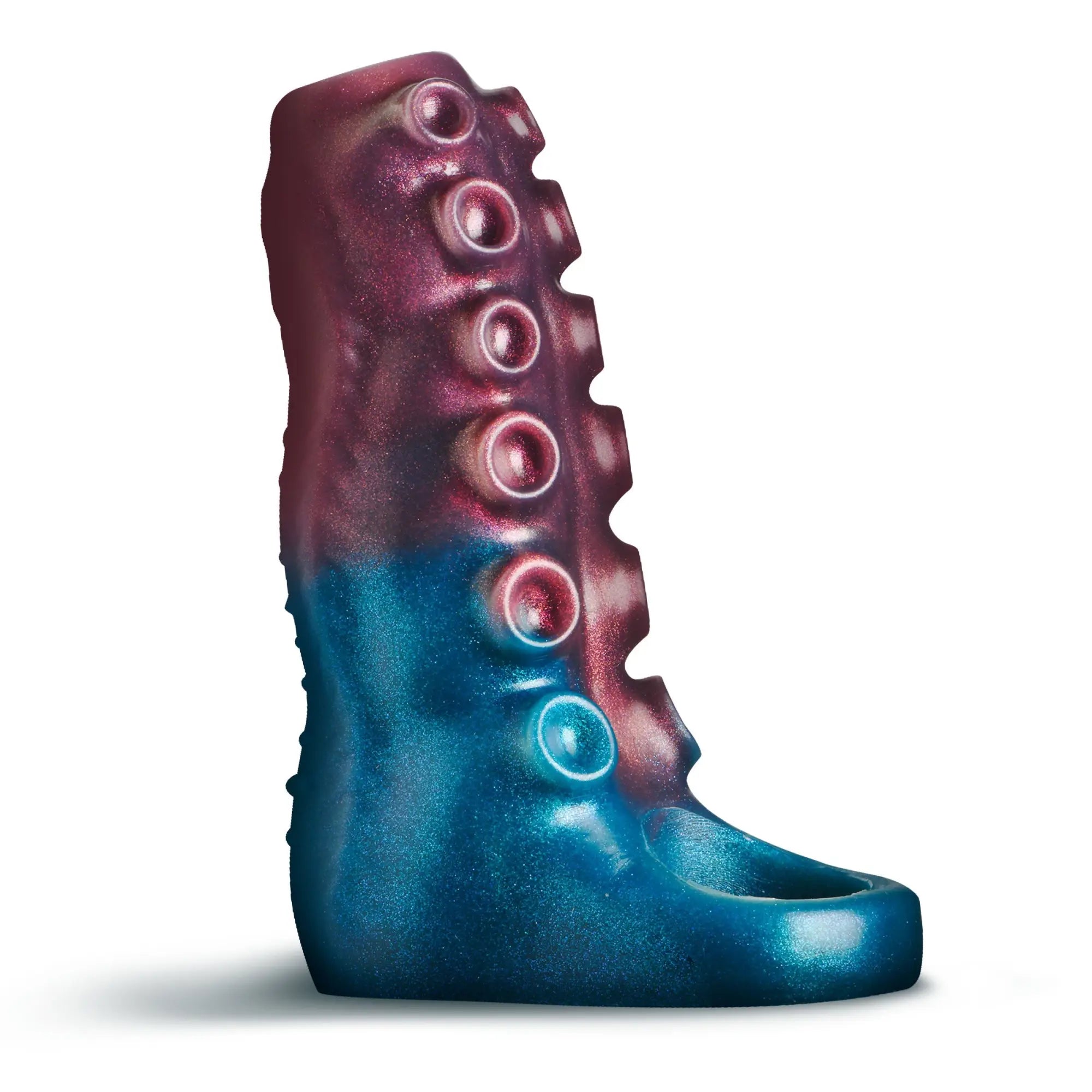 Creature Cocks Tentagirth silicone enhancer in blue and purple, featuring a textured, tentacle-inspired design.