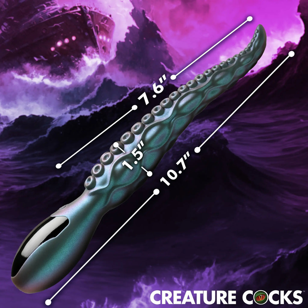Creature Cocks Tentavibe: A dark green, tentacle-shaped silicone vibrator with measurement lines against a purple sea.