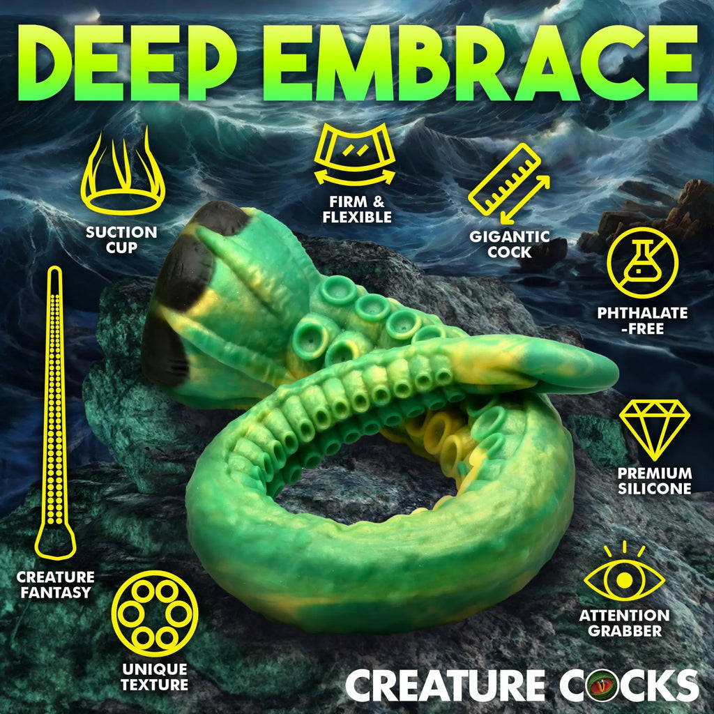 Creature Cocks Titan Tentacle dildo in green and yellow silicone, featuring suction cup base and suckered texture.