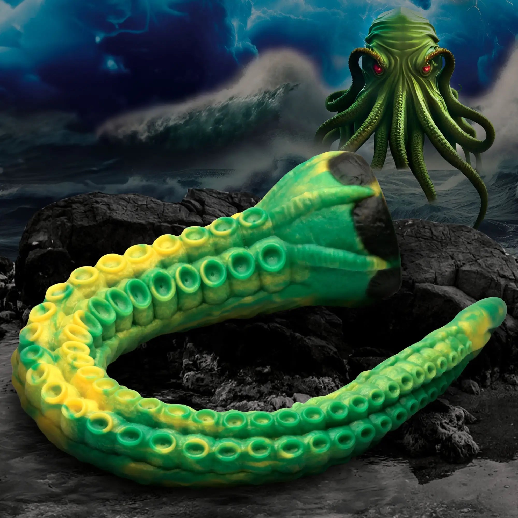 Creature Cocks Titan Tentacle silicone dildo in green and yellow, shaped like a long, suction-cupped tentacle.
