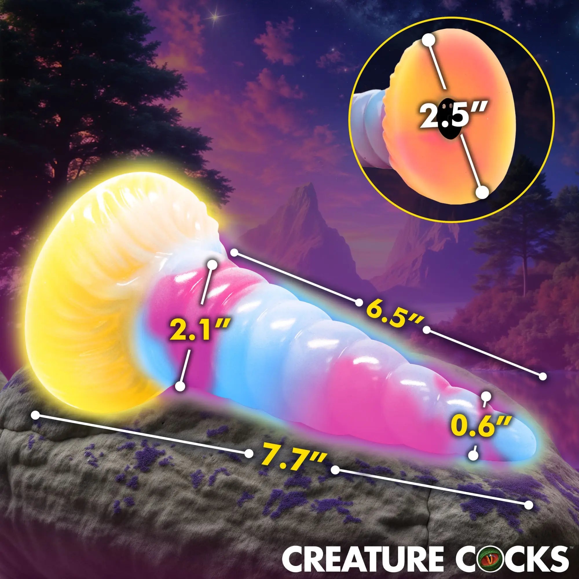 Creature Cocks Unicorn glow-in-the-dark silicone dildo with pink, blue, and yellow swirl design and dimension labels.