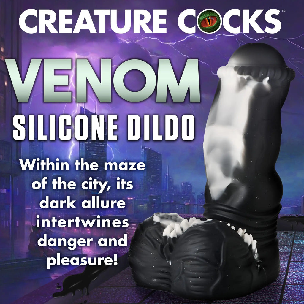 Creature Cocks Venom silicone dildo: A black, creature-style dildo with white details, set against a stormy city background.