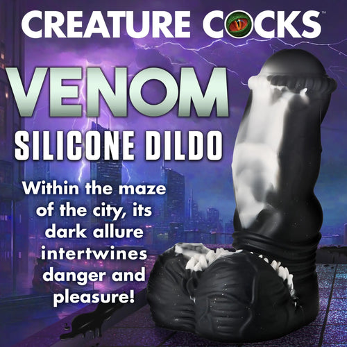 Creature Cocks Venom silicone dildo: A black, creature-style dildo with white details, set against a stormy city background.