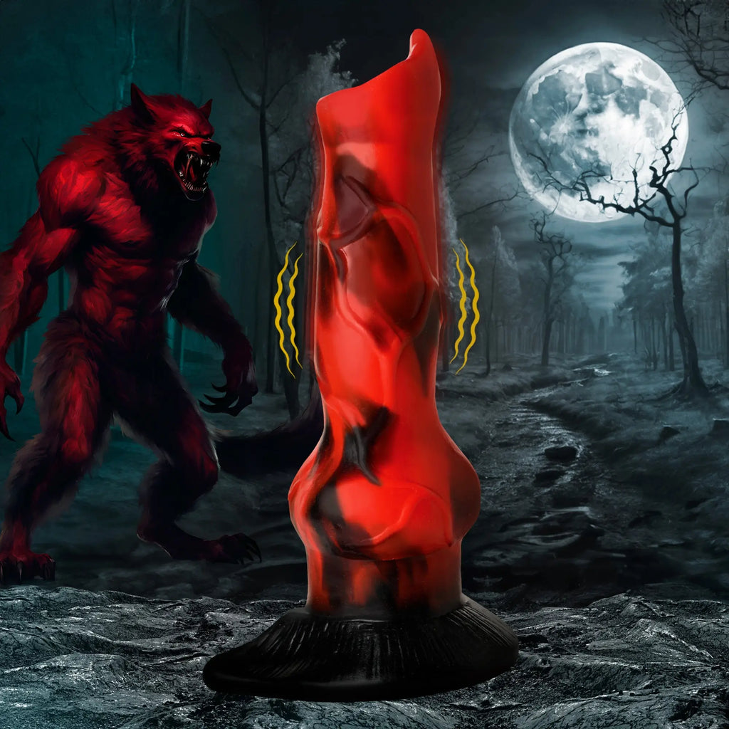 Creature Cocks Vibra Beast: red and black marbled, textured silicone vibrating dildo in a werewolf-themed background.
