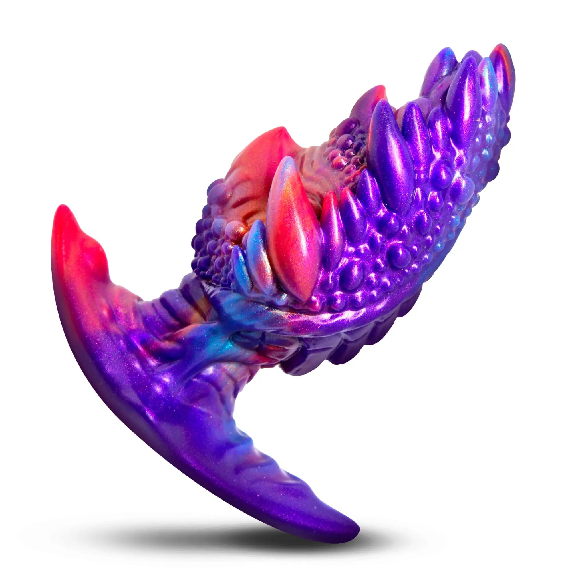 Creature Cocks Volkron silicone butt plug in a textured, purple and pink iridescent monster-inspired design.