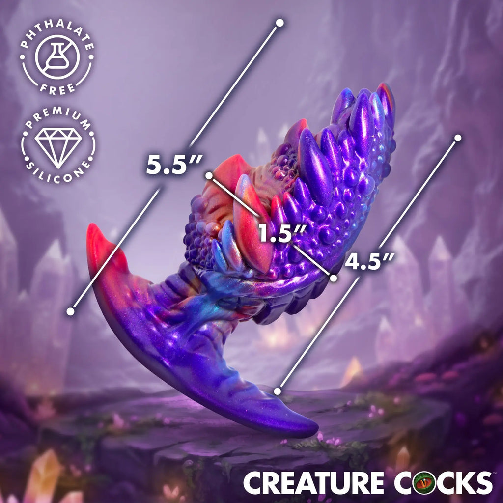 Creature Cocks Volkron silicone butt plug in a textured, iridescent purple-to-red gradient, shown with size dimensions.