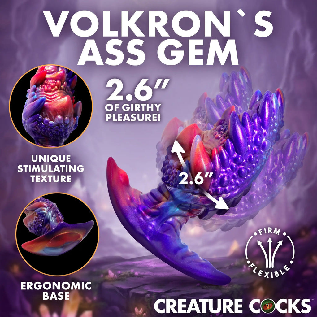 Creature Cocks Volkron silicone butt plug in a textured, iridescent purple-to-pink gradient with an ergonomic base.