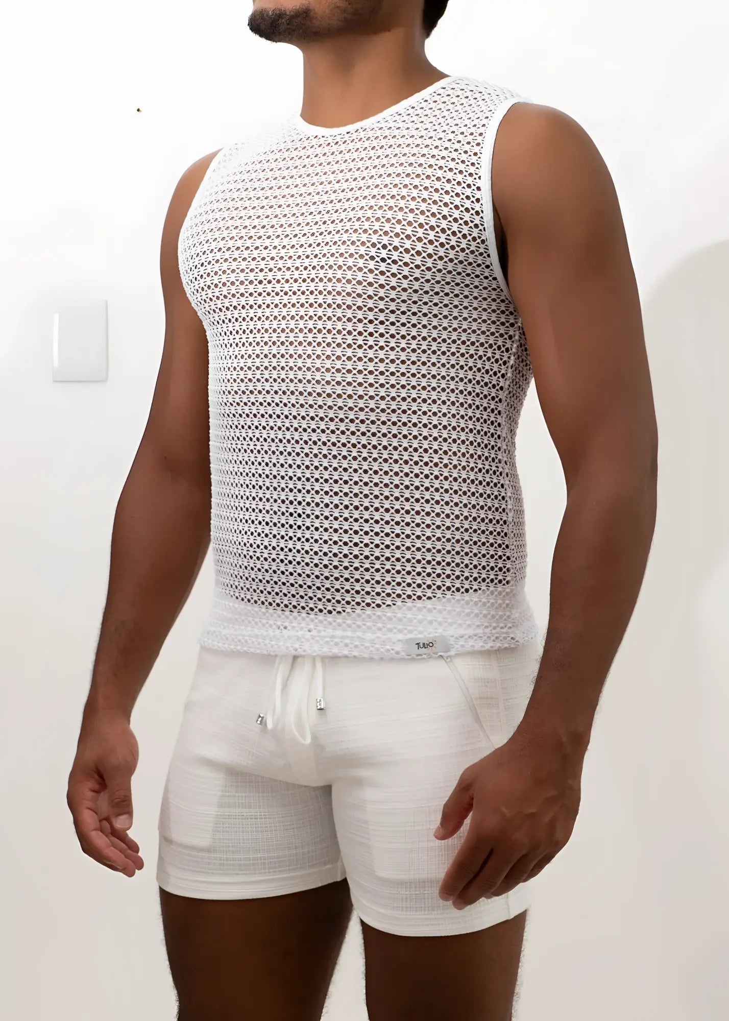 White crochet muscle tank top with sleeveless design mesh fabric and round neckline for casual wear