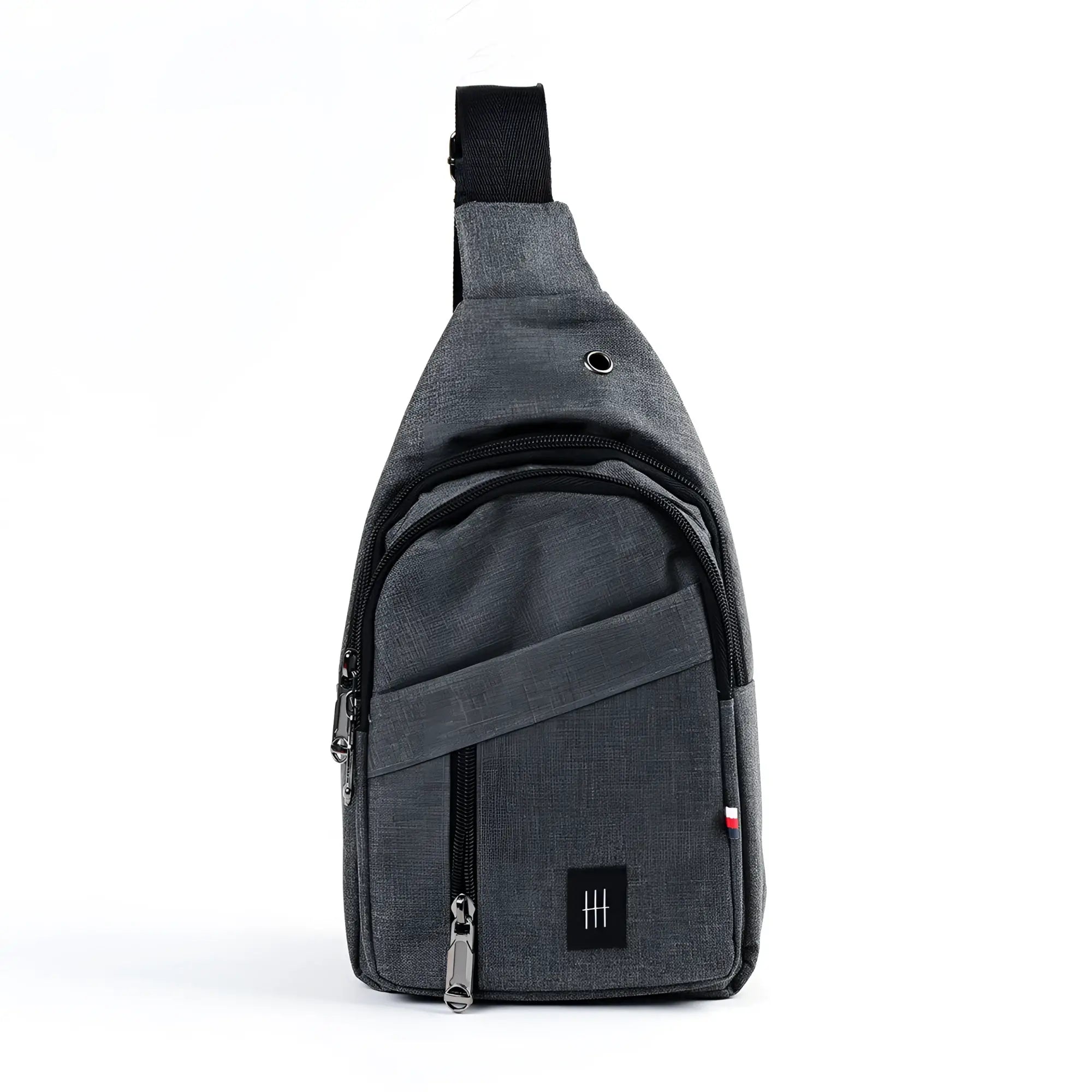 Crossbody sling bag made of gray textured fabric with black zipper pulls and a small black logo patch