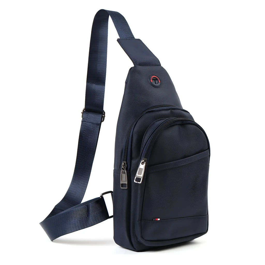 Navy blue nylon crossbody sling bag with silver zippers and red logo on the front for versatile everyday use