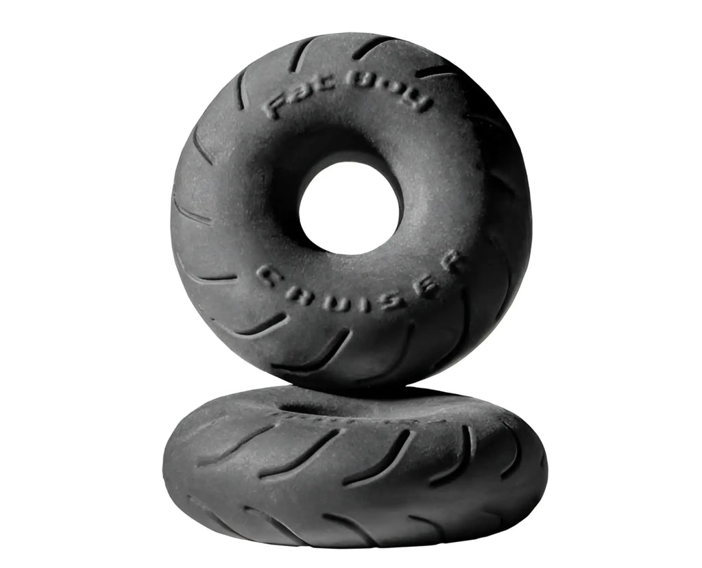Black rubber tire shaped cruiser product with fat boy cruiser embossed on its surface