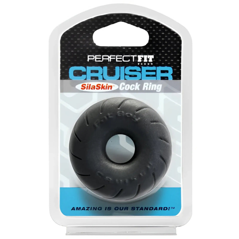 Black silicone cruiser cock ring with textured tire-like ridges and perfect fit branding embossed on the surface