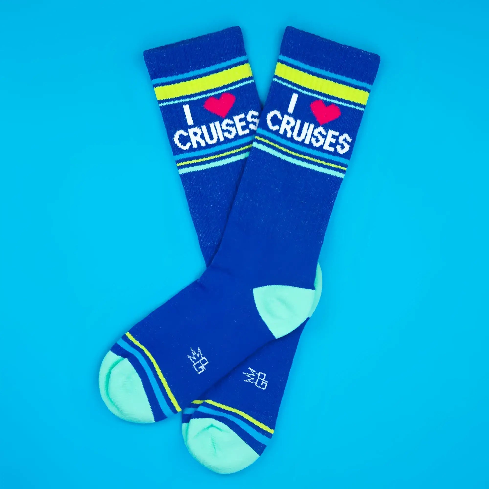 Blue crew socks with i heart cruises printed in white and red, accented by yellow and light blue stripes