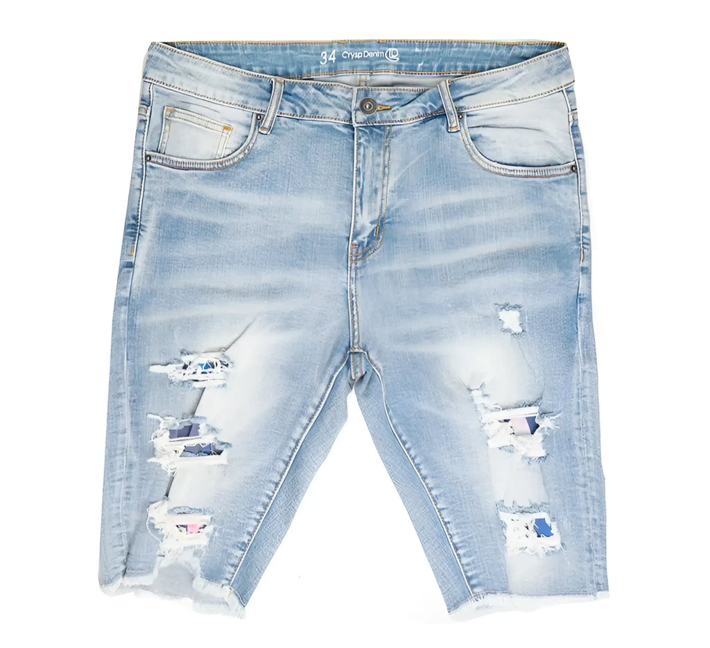 Light-wash crysp denim cut off shorts with distressed ripped details and frayed hems in front view